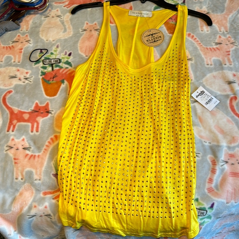 Pretty yellow tank top with studs never worn